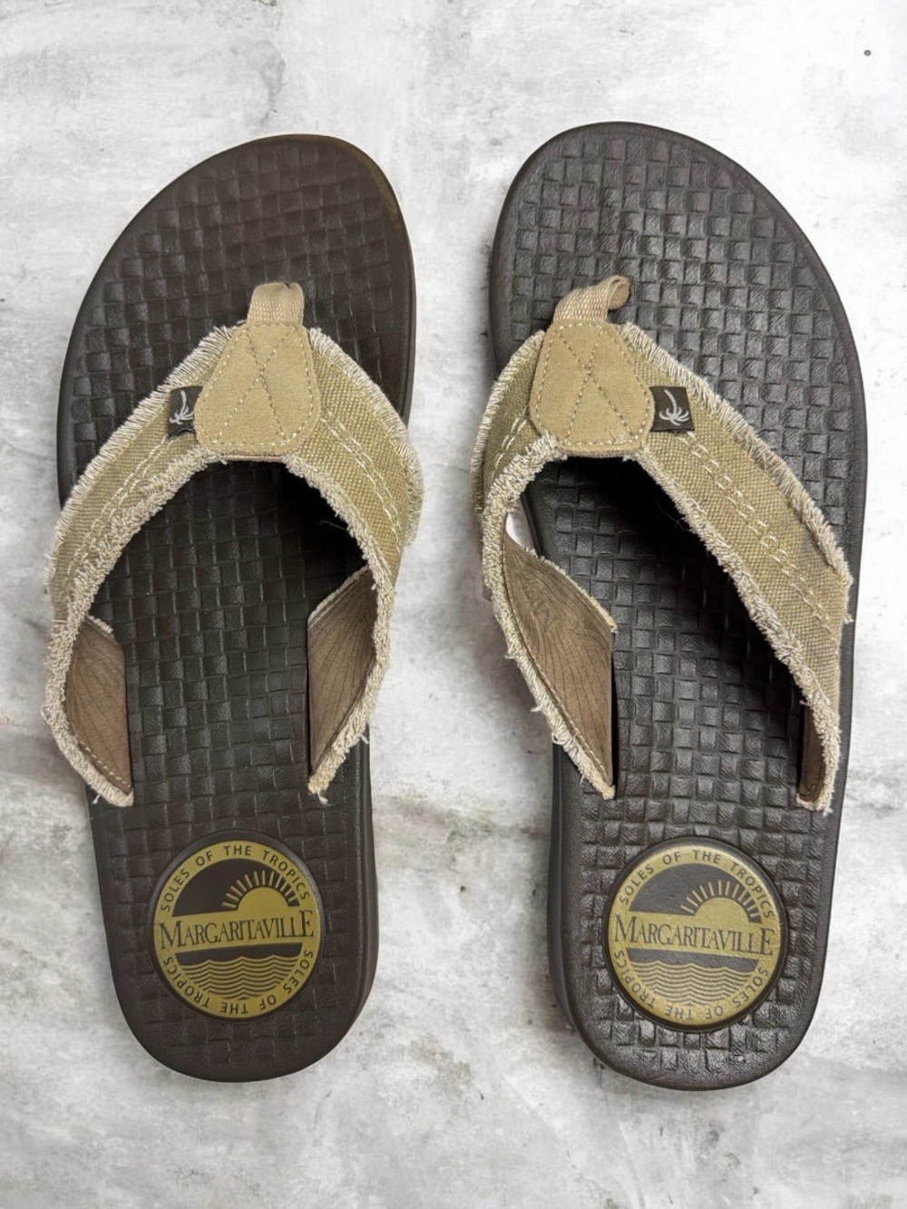 Margaritaville Men’s Dark Brown Footbed with Tan Frayed-Edge Flip Flops
